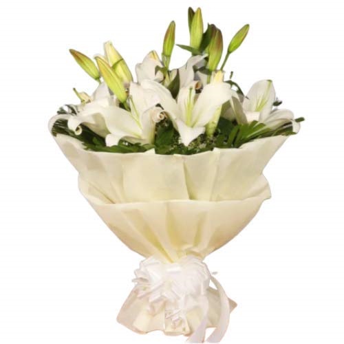 White Oriental Lilies flower bunch wrapped in white non woven fabric